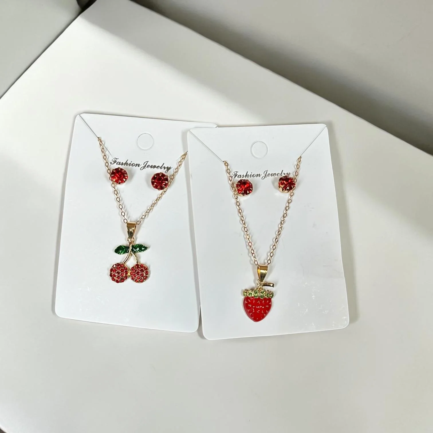 12 Sets Cereza Collar y Aretes Dorados $10 c/u