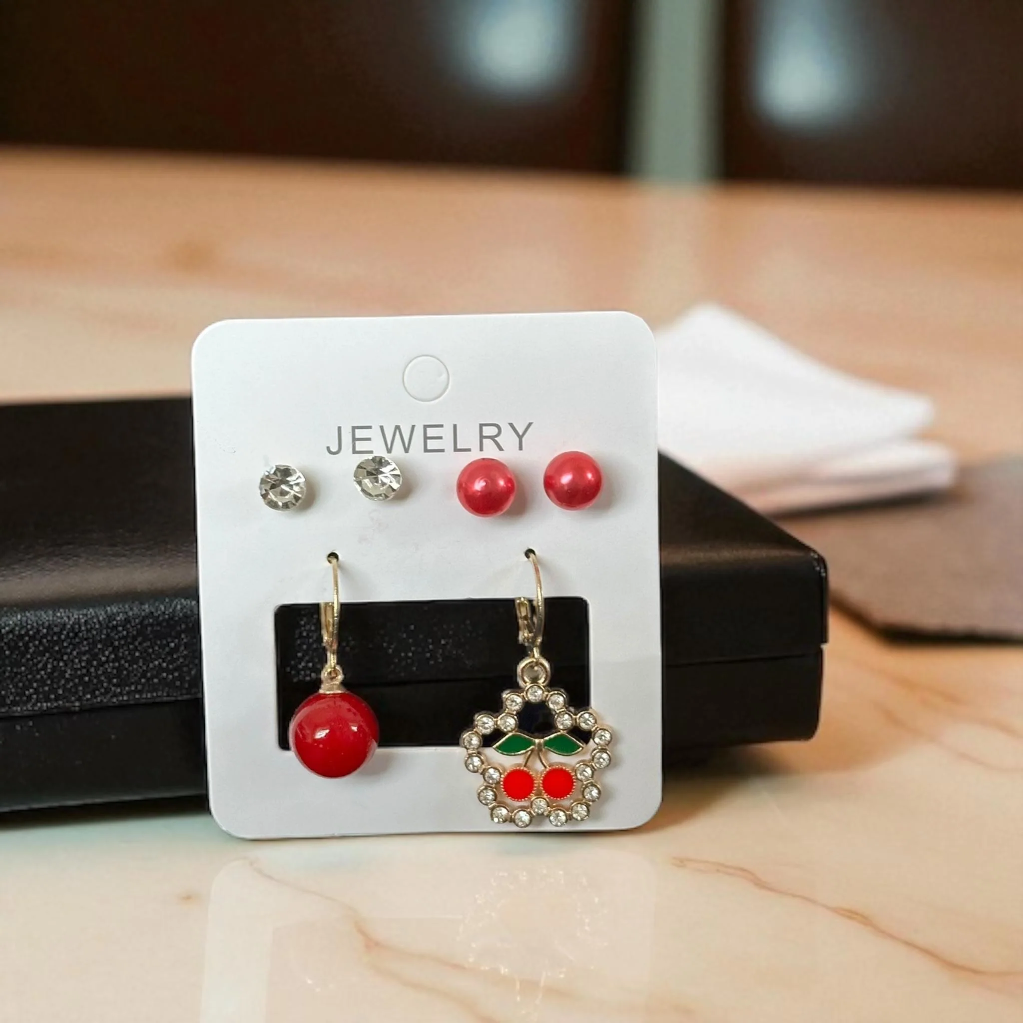 12 Sets de Aretes Cereza/ Pedreria $11.5 c/u